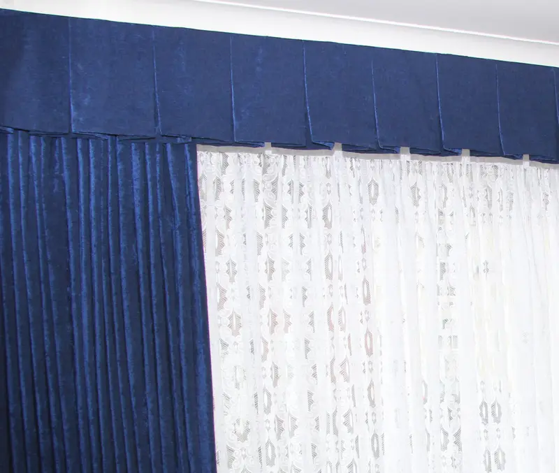 Blue pleated pelmet and curtains with sheers by Heather Horrocks Leigh
