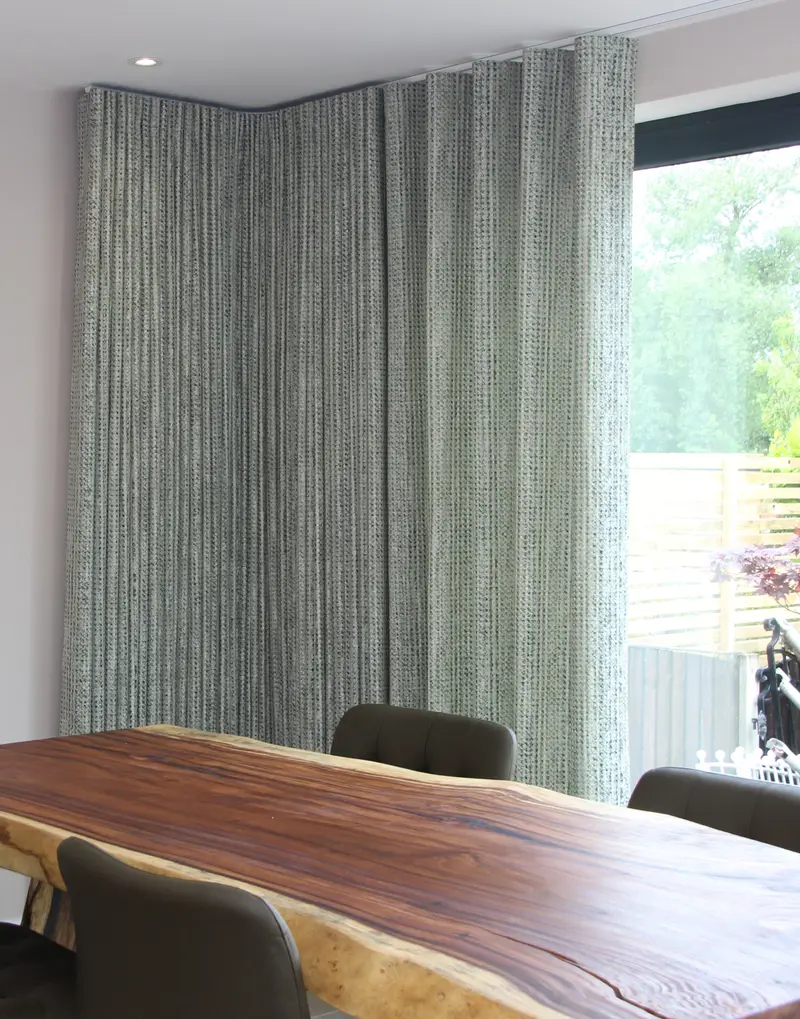Wave curtains in a dining room by Heather Horrocks Leigh