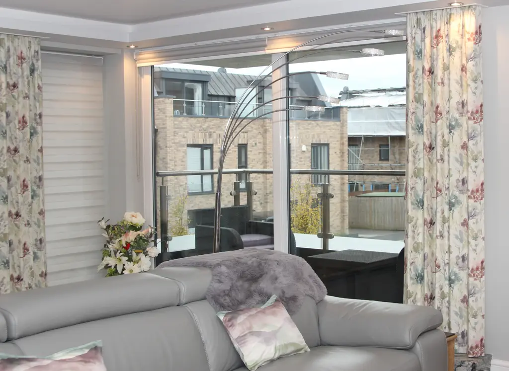 Floral made to measure curtains in a modern living room by Heather Horrocks Leigh