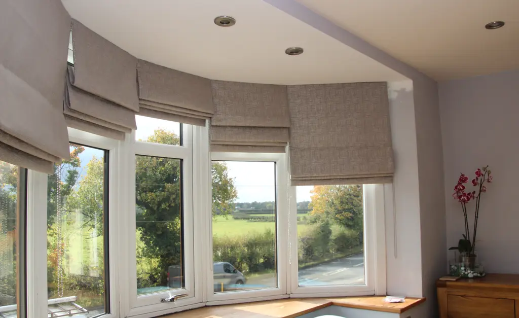 Made to measure Roman blinds in a bay window by Heather Horrocks Leigh