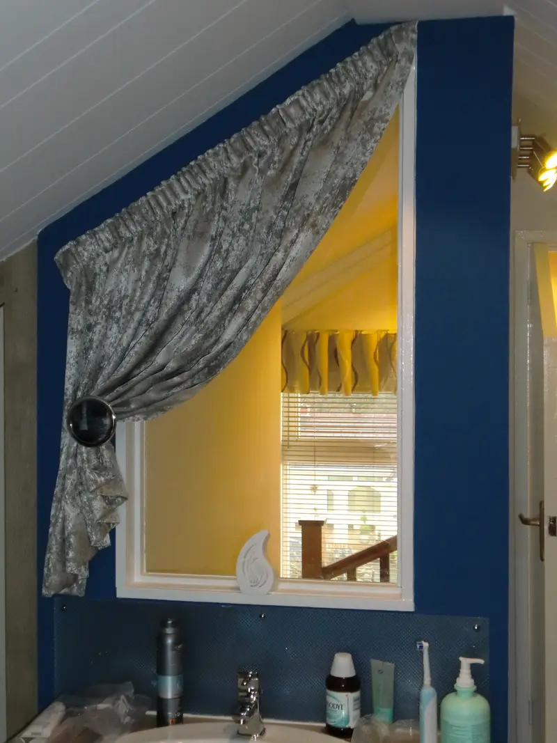 Swag curtain dressing an alcove window by Heather Horrocks Leigh